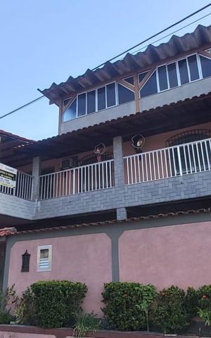 Casa à venda com 200m², 4 quartos e 1 vaga Casa à venda com 200m², 4 quartos e 1 vagaFachada