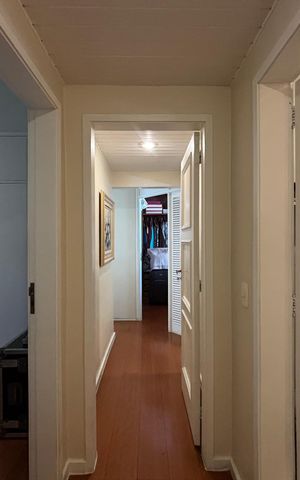 Apartamento à venda com 128m², 2 quartos e 1 vaga Apartamento à venda com 128m², 2 quartos e 1 vagaSala - corredor de acesso aos quartos