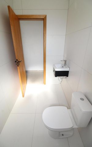 Casa de condomínio para alugar com 250m², 3 quartos e 4 vagasBanheiro da Suíte 3