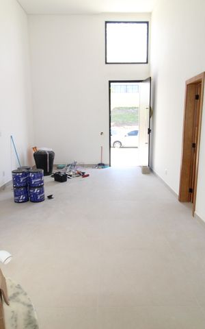 Casa de condomínio para alugar com 250m², 3 quartos e 4 vagasSala
