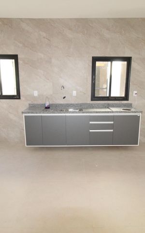 Casa de condomínio para alugar com 250m², 3 quartos e 4 vagasCozinha