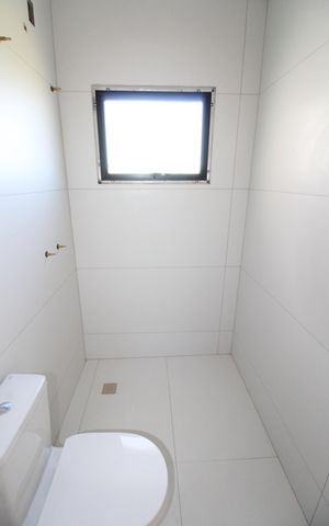 Casa de condomínio para alugar com 265m², 3 quartos e 4 vagasBanheiro da Suíte 1