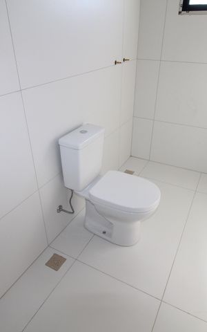 Casa de condomínio para alugar com 265m², 3 quartos e 4 vagasBanheiro da Suíte