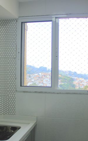 Apartamento à venda com 56m², 2 quartos e 1 vagaCozinha com área de serviço 