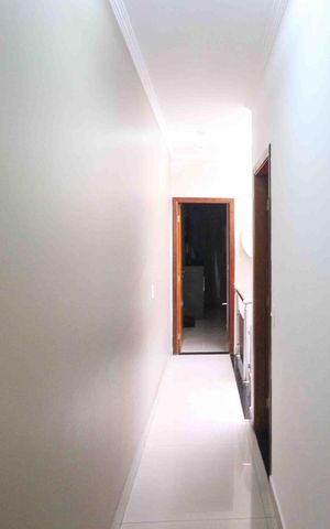 Casa à venda com 140m², 3 quartos e 2 vagas Casa à venda com 140m², 3 quartos e 2 vagasCorredor