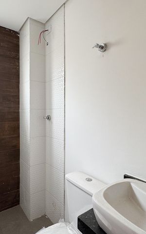 Apartamento à venda com 55m², 2 quartos e 1 vagaBanheiro Social