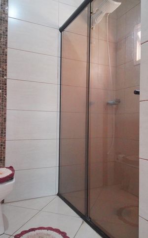 Casa à venda com 118m², 3 quartos e 1 vagaBanheiro