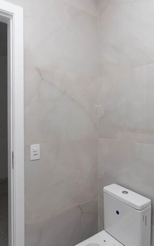 Casa à venda com 300m², 4 quartos e 4 vagas Casa à venda com 300m², 4 quartos e 4 vagasBanheiro da Suíte 3
