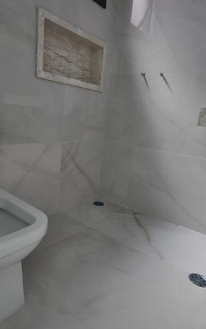 Casa à venda com 300m², 4 quartos e 4 vagasBanheiro da Suíte 2
