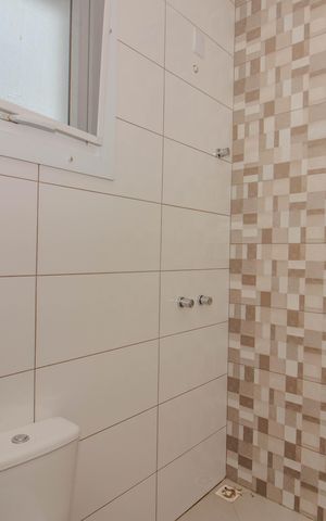 Casa de condomínio à venda com 121m², 3 quartos e 1 vaga Casa de condomínio à venda com 121m², 3 quartos e 1 vagaBanheiro da Suíte 1