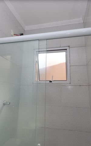 Casa de condomínio para alugar com 117m², 2 quartos e 1 vagaBanheiro da Suíte 1