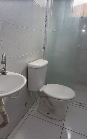 Casa de condomínio para alugar com 117m², 2 quartos e 1 vagaBanheiro da Suíte 1