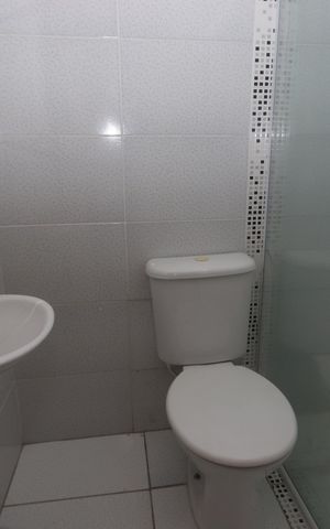 Casa de condomínio para alugar com 117m², 2 quartos e 1 vagaBanheiro da Suíte 2