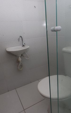 Casa de condomínio para alugar com 117m², 2 quartos e 1 vagaBanheiro da Suíte 2