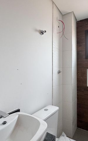 Apartamento à venda com 55m², 2 quartos e 1 vaga Apartamento à venda com 55m², 2 quartos e 1 vagaBanheiro Social