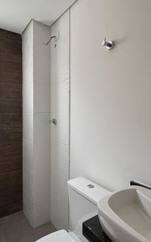 Apartamento à venda com 55m², 2 quartos e 1 vaga Apartamento à venda com 55m², 2 quartos e 1 vagaBanheiro Social