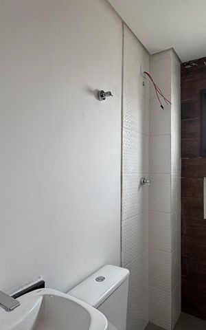 Apartamento à venda com 55m², 2 quartos e 1 vaga Apartamento à venda com 55m², 2 quartos e 1 vagaBanheiro Social