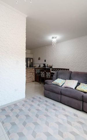 Casa de condomínio à venda com 115m², 3 quartos e 2 vagasSala/Cozinha