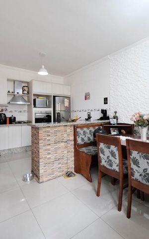 Casa de condomínio à venda com 115m², 3 quartos e 2 vagasSala/Cozinha