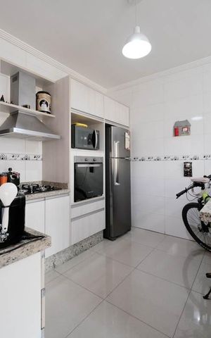 Casa de condomínio à venda com 115m², 3 quartos e 2 vagasSala/Cozinha