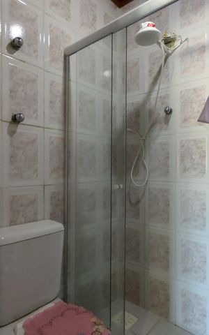 Casa de condomínio à venda com 401m², 5 quartos e 4 vagasBanheiro da Suíte 3