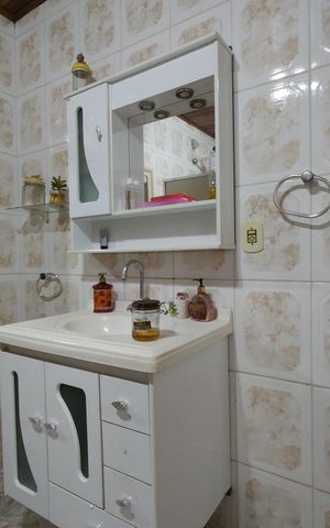 Casa de condomínio à venda com 401m², 5 quartos e 4 vagasBanheiro Social
