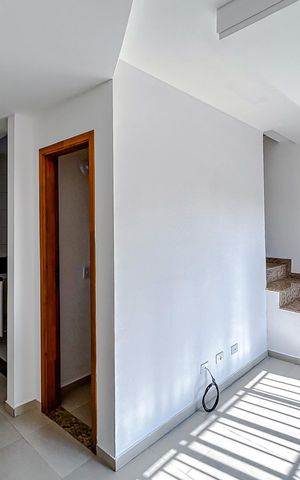 Casa de condomínio à venda com 83m², 3 quartos e 2 vagasSala