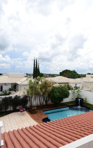Casa de condomínio para alugar com 454m², 4 quartos e 3 vagasQuarto 1 - Suíte Vista