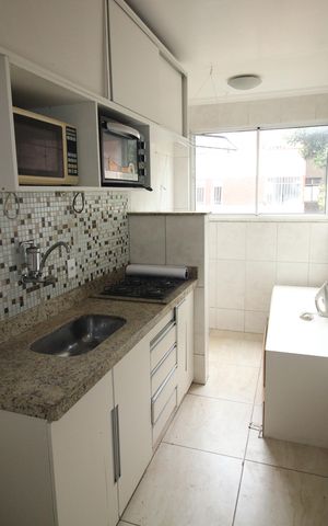 Apartamento à venda com 64m², 2 quartos e 1 vagaCozinha e Área de Serviço