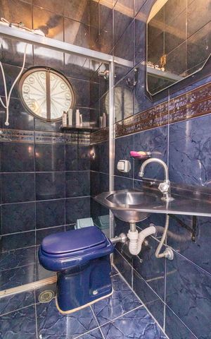 Casa à venda com 399m², 4 quartos e 2 vagasBanheiro 3