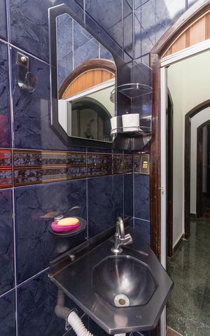 Casa à venda com 399m², 4 quartos e 2 vagasBanheiro 3