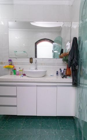 Casa à venda com 399m², 4 quartos e 2 vagasBanheiro do Quarto 1 - Suíte
