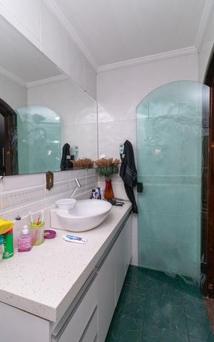 Casa à venda com 399m², 4 quartos e 2 vagasBanheiro do Quarto 1 - Suíte