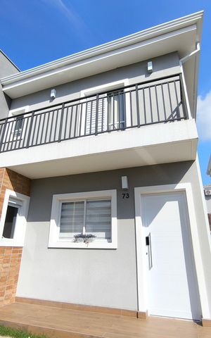 Casa de condomínio à venda com 106m², 3 quartos e 2 vagas Casa de condomínio à venda com 106m², 3 quartos e 2 vagasFachada