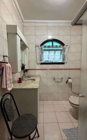 Casa à venda com 393m², 3 quartos e 2 vagas Casa à venda com 393m², 3 quartos e 2 vagasBanheiro