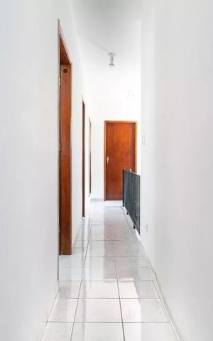 Casa à venda com 578m², 5 quartos e 3 vagas Casa à venda com 578m², 5 quartos e 3 vagasCorredor
