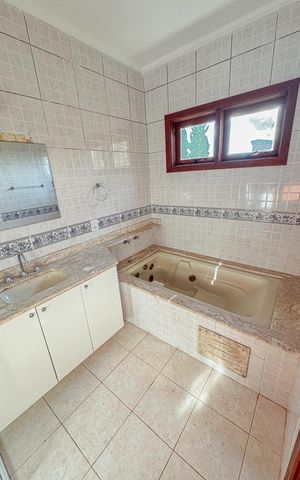 Casa de condomínio à venda com 488m², 4 quartos e 4 vagasBanheiro