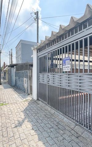 Casa à venda com 340m², 3 quartos e 2 vagasFachada + plaquinha