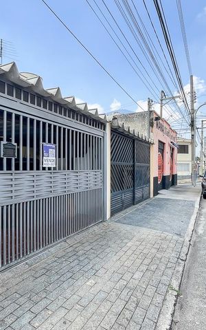 Casa à venda com 340m², 3 quartos e 2 vagasFachada + plaquinha