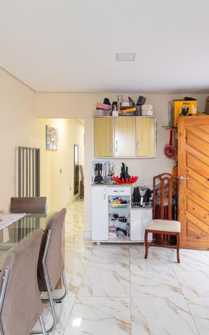 Casa à venda com 130m², 3 quartos e 2 vagas Casa à venda com 130m², 3 quartos e 2 vagasCozinha