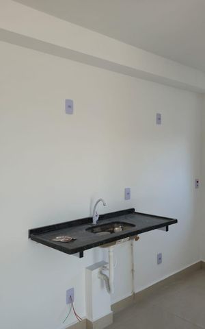 Apartamento à venda com 46m², 2 quartos e 1 vaga Apartamento à venda com 46m², 2 quartos e 1 vagaCozinha e Área de Serviço