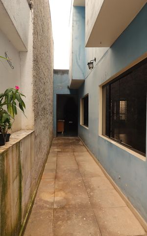 Casa à venda com 391m², 4 quartos e 3 vagasCorredor externo