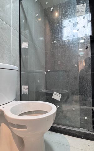 Casa de condomínio à venda com 410m², 4 quartos e 2 vagas Casa de condomínio à venda com 410m², 4 quartos e 2 vagasSuíte 1 - Banheiro