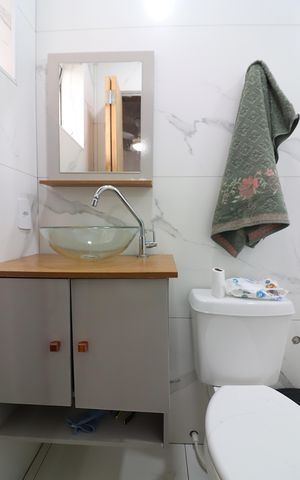Casa à venda com 118m², 3 quartos e 2 vagasQuarto 1 - Suíte Banheiro 