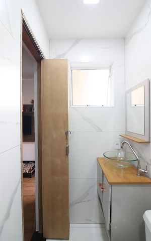 Casa à venda com 118m², 3 quartos e 2 vagasQuarto 1 - Suíte Banheiro 