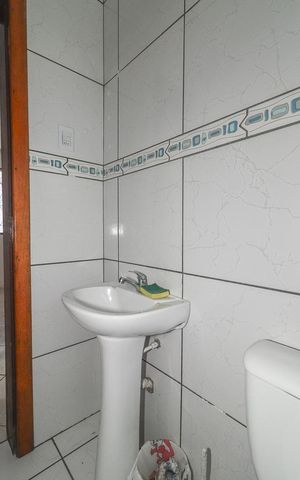 Casa à venda com 130m², 2 quartos e 1 vagaBanheiro 2