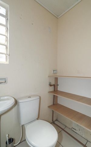Casa à venda com 130m², 2 quartos e 1 vagaBanheiro 3 / Fundos