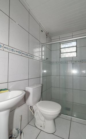 Casa à venda com 130m², 2 quartos e 1 vagaBanheiro 2