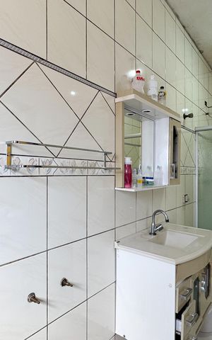 Casa à venda com 282m², 4 quartos e 2 vagasBanheiro - Suíte