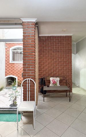 Casa à venda com 282m², 4 quartos e 2 vagasSala